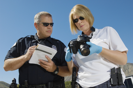 Police Officer and Investigator with Camera